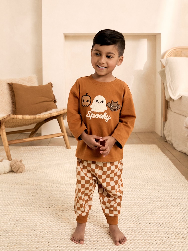 Orange Checkerboard Halloween Pyjamas (9mths-12yrs) - Image 1 of 5 Orange Checkerboard Halloween Pyjamas (9mths-12yrs) - Image 1 of 5
