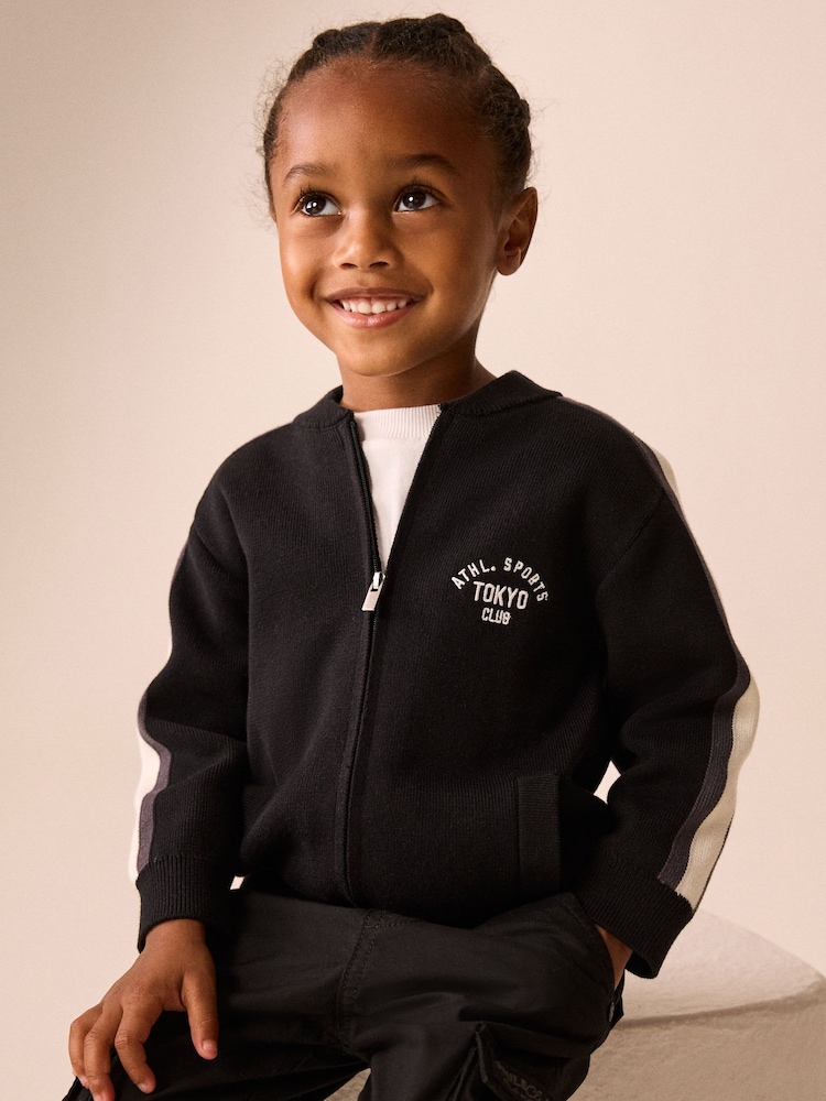 Black/White Zip Up Knitted Bomber Cardigan (3mths-7yrs) - Image 1 of 8 Black/White Zip Up Knitted Bomber Cardigan (3mths-7yrs) - Image 1 of 8