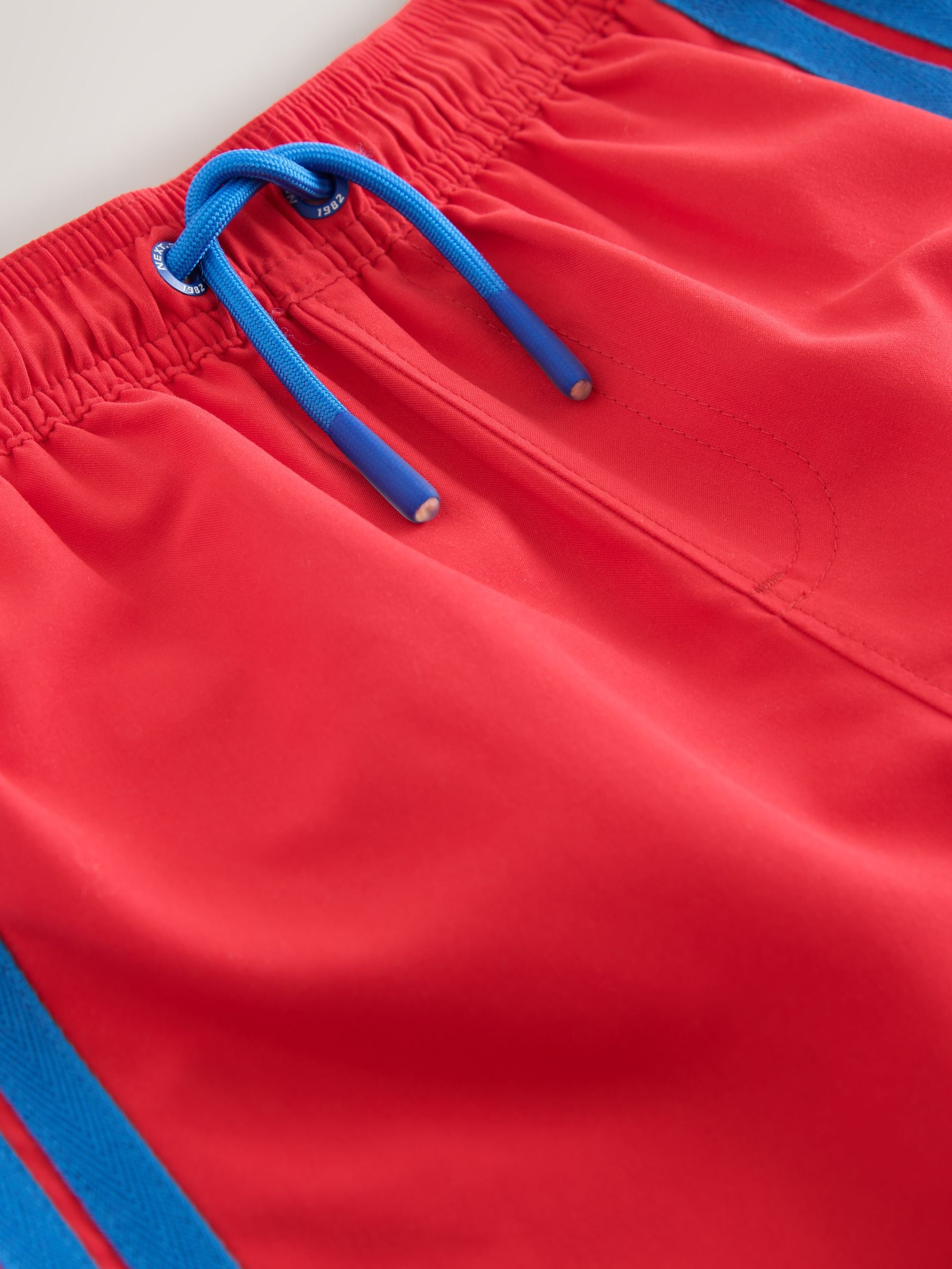 Buy Red Side Stripe Swim Shorts (3-16yrs) from Next Romania