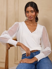 Love & Roses Ivory Spot Mesh Long Sleeve V-Neck Top - Image 1 of 5
