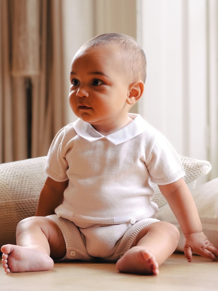 Emile Et Rose Natural Logan Knitted Romper with Mock Pockets & Collar - Image 1 of 4 Emile Et Rose Natural Logan Knitted Romper with Mock Pockets & Collar - Image 1 of 4