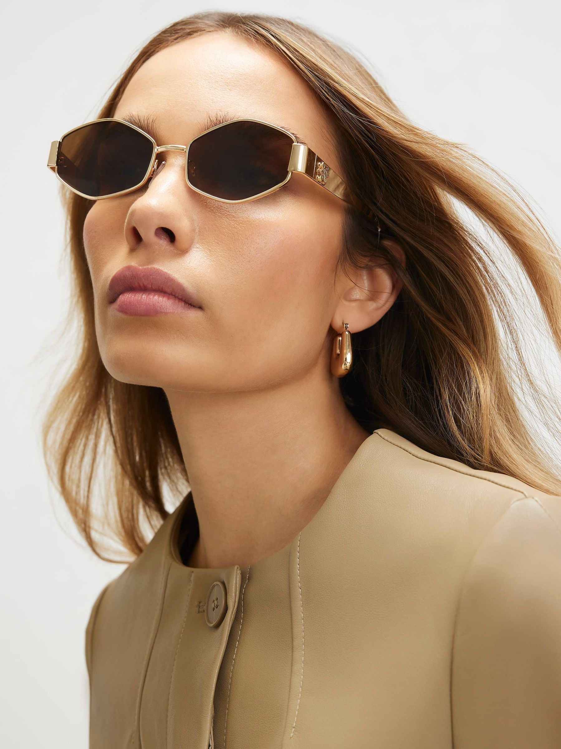 Buy River Island Gold Metal Slim Hexagon Sunglasses from Next