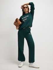River Island Green Les Parisiennes Embroidered Joggers - Image 1 of 4