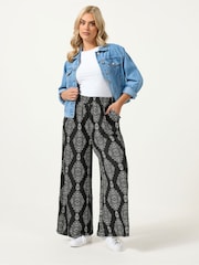 Yours Curve Black Floral Blur Print Trousers 28" - Image 2 of 5