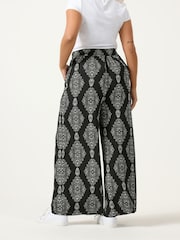 Yours Curve Black Floral Blur Print Trousers 28" - Image 3 of 5