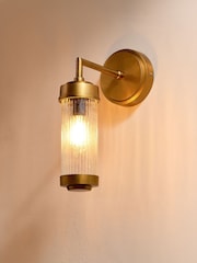 Nkuku Antique Brass Akurdi Bathroom Single Wall Lamp - Image 1 of 5