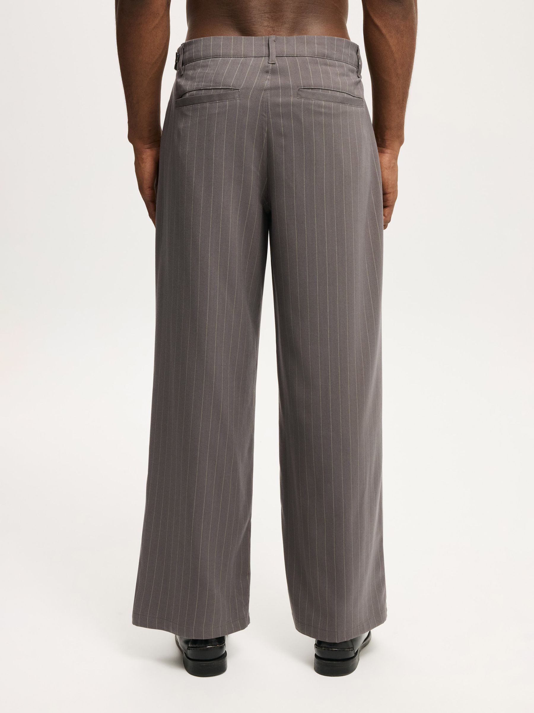 Buy Cotton On Charcoal Pinstripe Super Baggy Pleated Trousers from