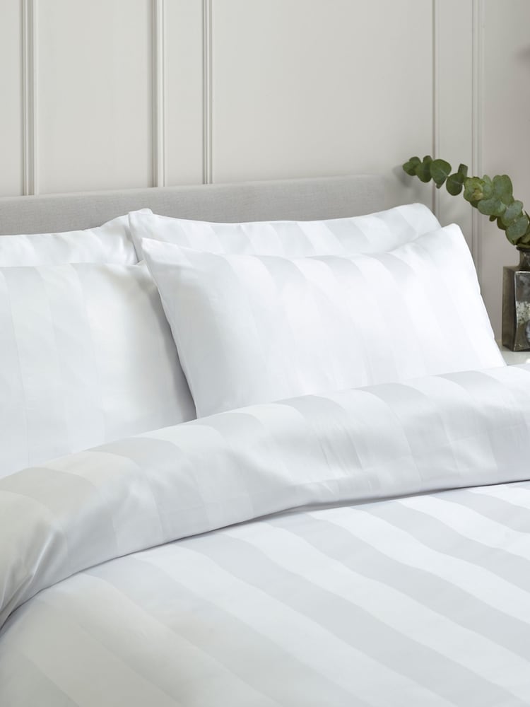 Catherine Lansfield 4 Pack White So Soft Satin Stripe Non Iron Pillowcases - Image 1 of 2 Catherine Lansfield 4 Pack White So Soft Satin Stripe Non Iron Pillowcases - Image 1 of 2