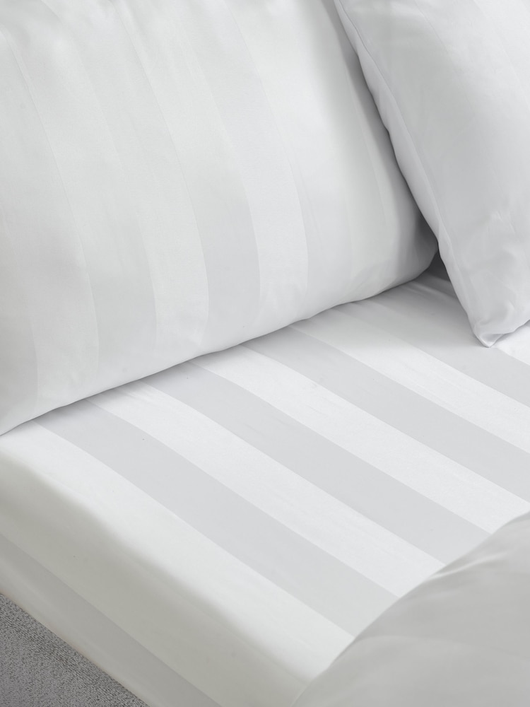 Catherine Lansfield 4 Pack White So Soft Satin Stripe Non Iron Pillowcases - Image 2 of 2 Catherine Lansfield 4 Pack White So Soft Satin Stripe Non Iron Pillowcases - Image 2 of 2