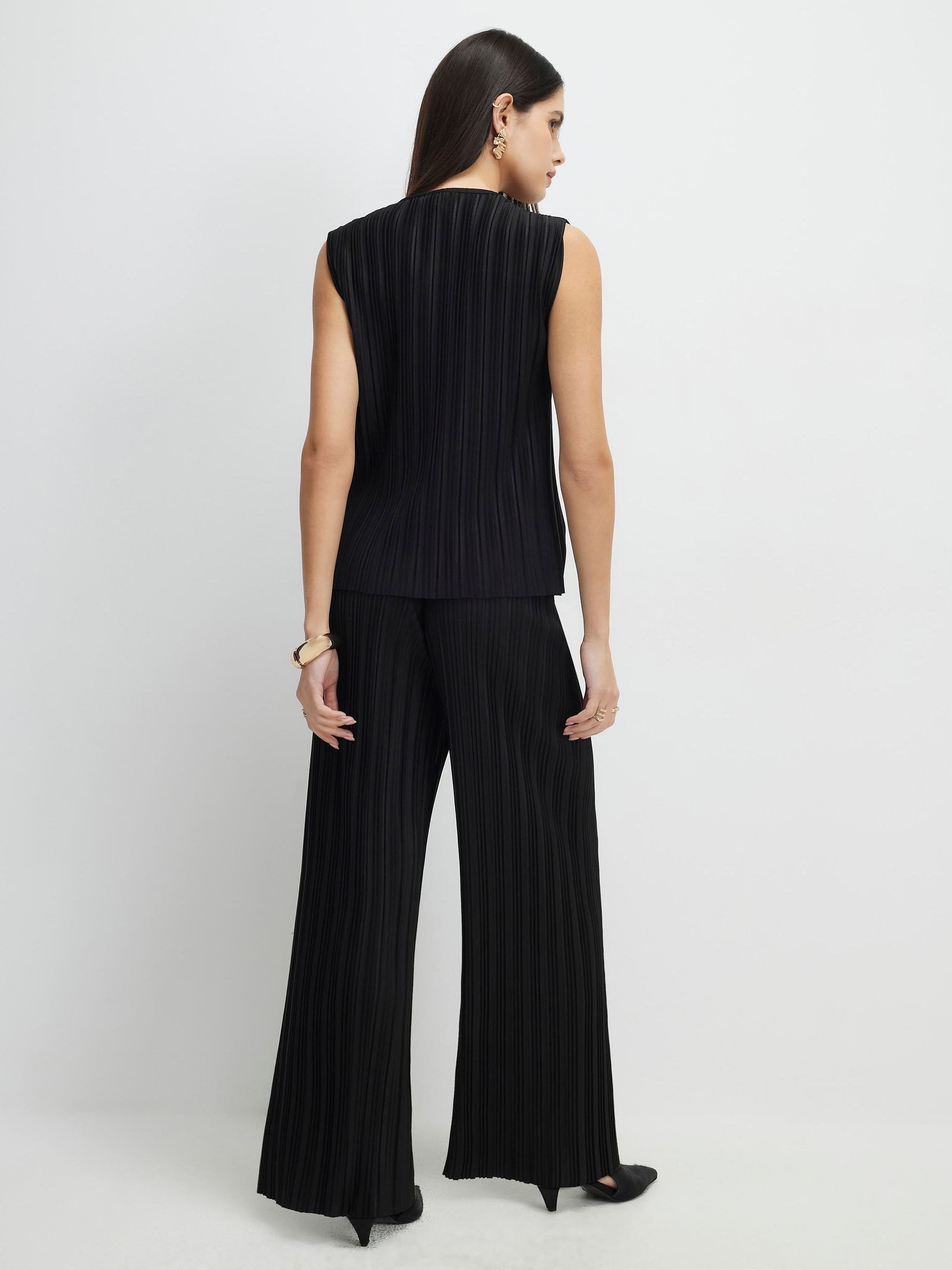 Buy River Island Black Plisse Wide Leg Elasticated Trousers from