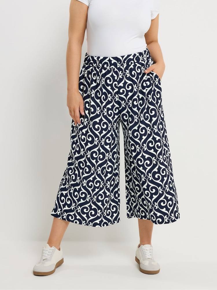 Yours Curve Blue Abstract Wide Leg Trousers - Image 1 of 5