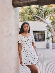 Black/White Polka Dot Flutter Sleeve Mini Dress - Image 1 of 4