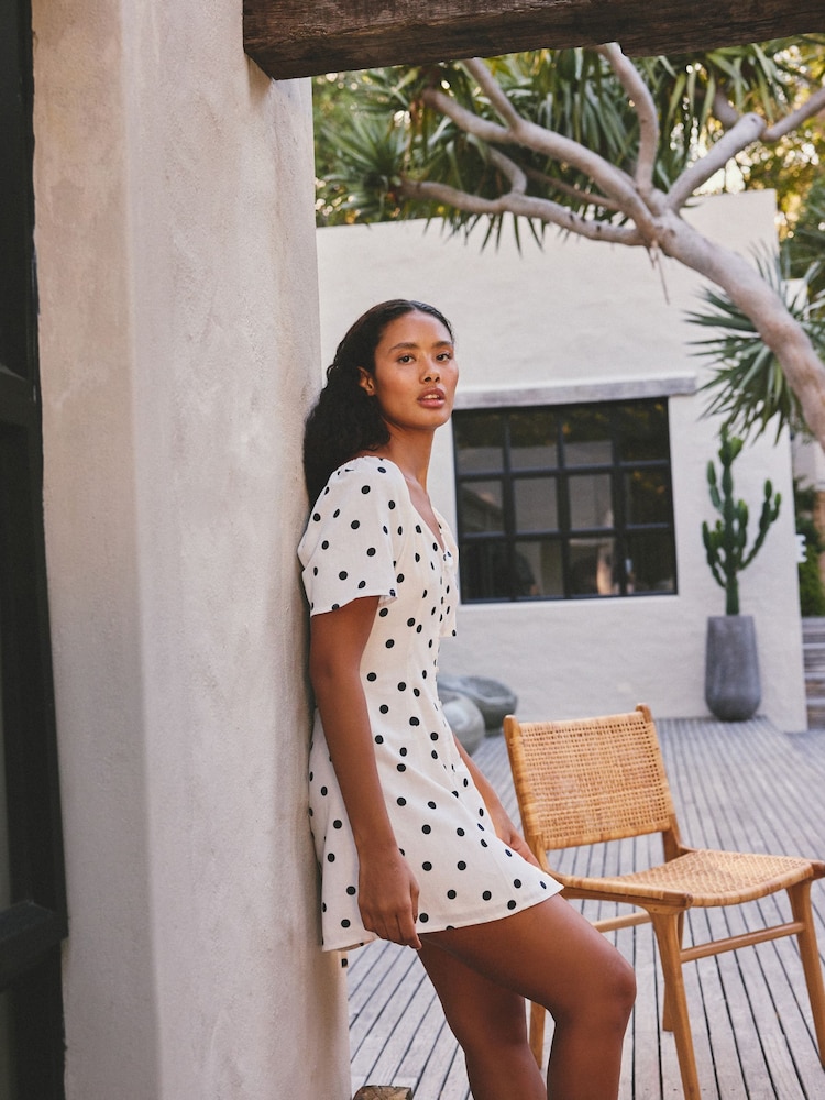 Black/White Polka Dot Flutter Sleeve Mini Dress - Image 2 of 4 Black/White Polka Dot Flutter Sleeve Mini Dress - Image 2 of 4