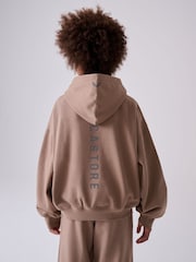 صخري - طقم من هودي كبير الحجم وبنطلون رياضي من Castore - Image 5 of 9
