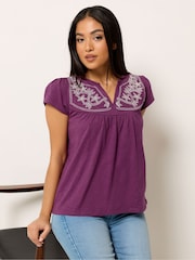 M&Co Purple Petite Embroidered Notch Neck Top - Image 1 of 5