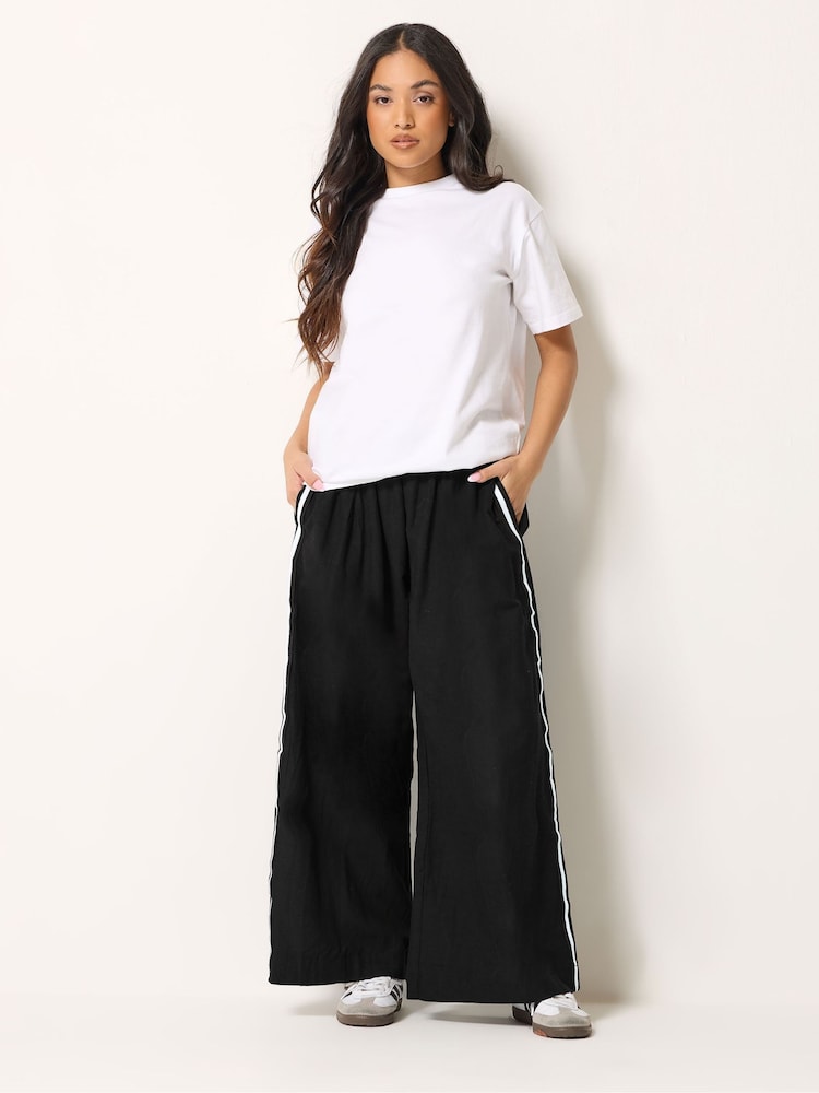 PixieGirl Petite Black Linen Blend Side Stripe Wide Leg Trousers - Image 1 of 5