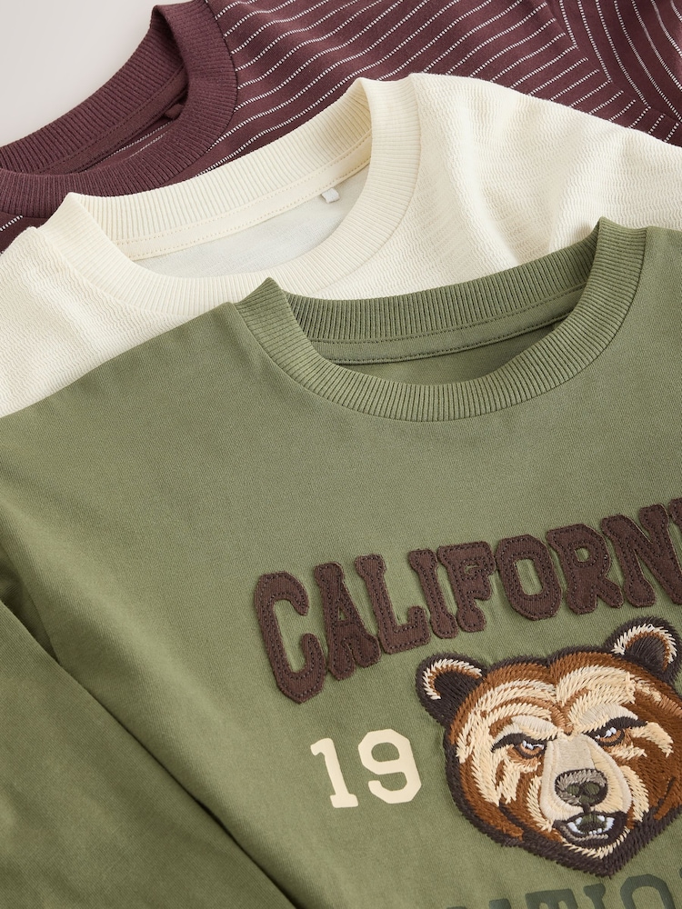 Berry/Green/Ecru Graphic Long Sleeve Relaxed Fit T-Shirts 3 Pack (3-16yrs) - Image 7 of 7 Berry/Green/Ecru Graphic Long Sleeve Relaxed Fit T-Shirts 3 Pack (3-16yrs) - Image 7 of 7