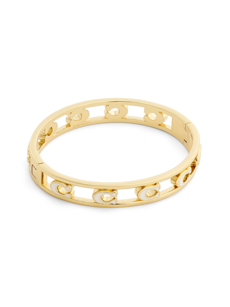 COACH Gold Tone Tone Signature C Enamel Openwork Bangle Bracelet - Image 1 of 5