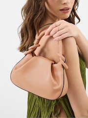 Accessorize håndveske med knutedetaljer - Bilde 1 av 3