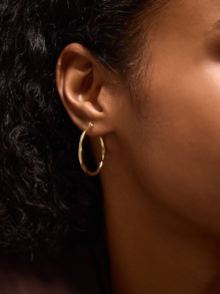 Accessorize Gold Tone Molten Hoop Earrings - Image 1 of 2 Accessorize Gold Tone Molten Hoop Earrings - Image 1 of 2
