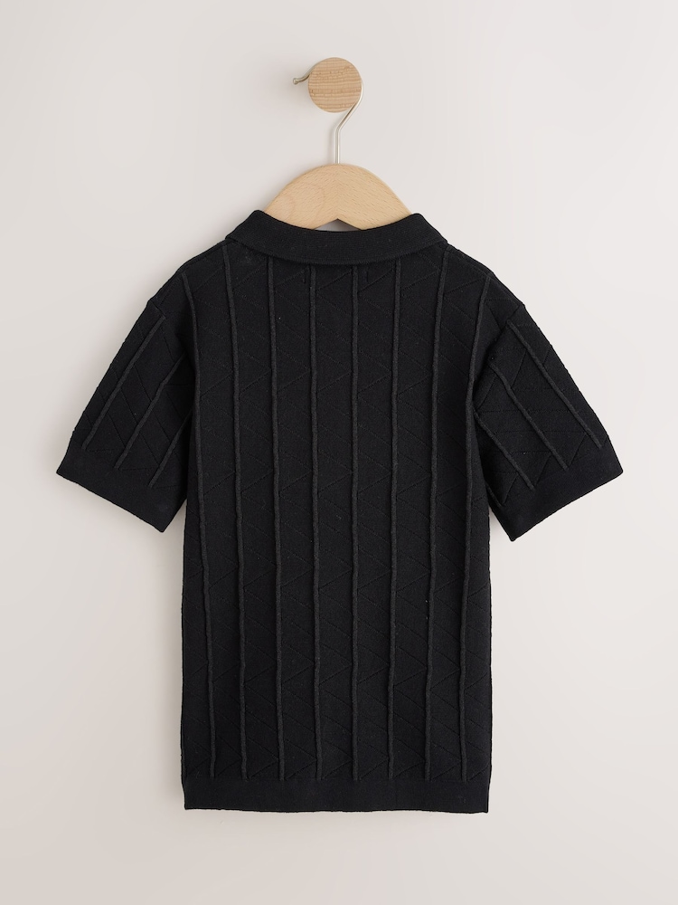 Black Zip Neck Texture Short Sleeve Polo Shirt (3-16yrs) - Image 2 of 4 Black Zip Neck Texture Short Sleeve Polo Shirt (3-16yrs) - Image 2 of 4