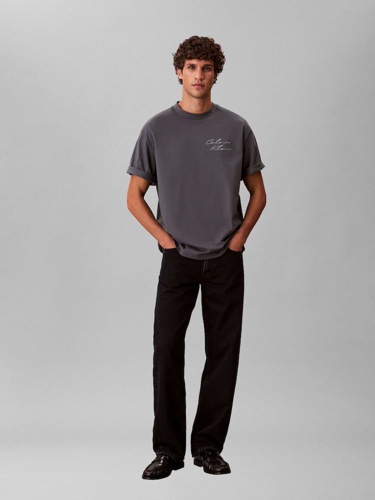 Calvin Klein Grey Relaxed Script Logo T-Shirt - Image 1 of 4 Calvin Klein Grey Relaxed Script Logo T-Shirt - Image 1 of 4