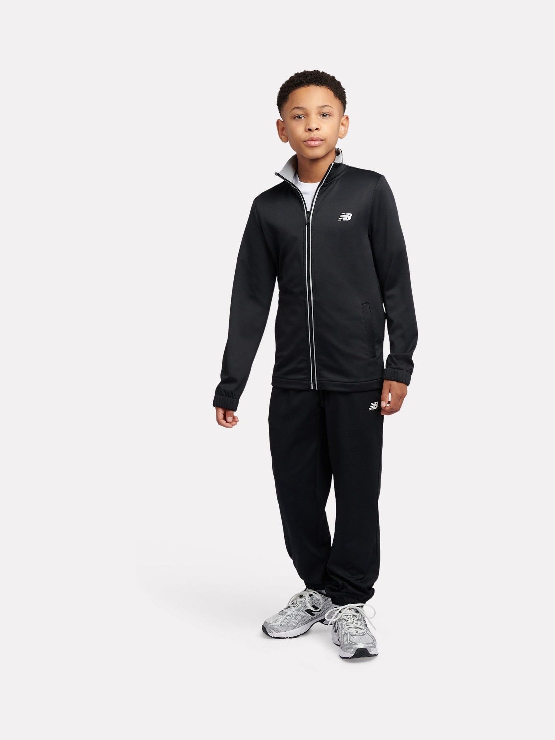 Buy New Balance Black Quarter Zip Funnel & Joggers Set from Next USA