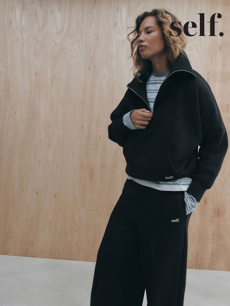 self. Black Half Zip Sweatshirt - Image 1 of 5 self. Black Half Zip Sweatshirt - Image 1 of 5