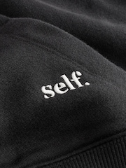 שחור - .self סווטשירט עם חצי רוכסן - תמונה 6 מתוך 7
