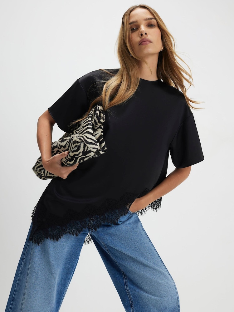 River Island Black Short Sleeve Asymmetric Satin Lace Hem T-Shirt - Image 1 of 4