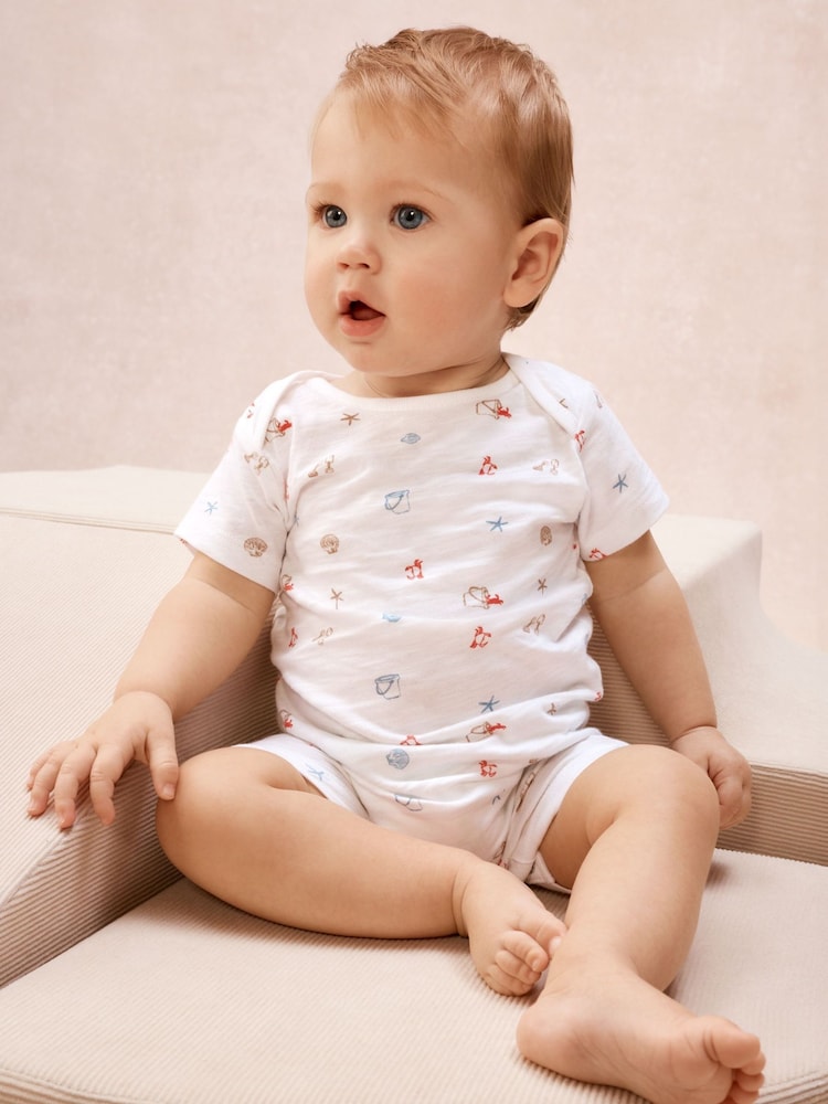 The White Company White Cotton Blend Beach Scene Shortie Rompersuit - Image 1 of 1 The White Company White Cotton Blend Beach Scene Shortie Rompersuit - Image 1 of 1