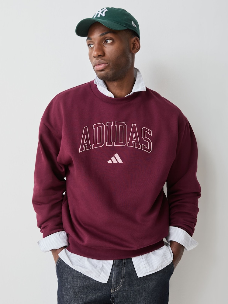 adidas Burgundy Seasonal Essentials Collegiate Fleece Crew Sweatshirt - Image 1 of 4 adidas Burgundy Seasonal Essentials Collegiate Fleece Crew Sweatshirt - Image 1 of 4