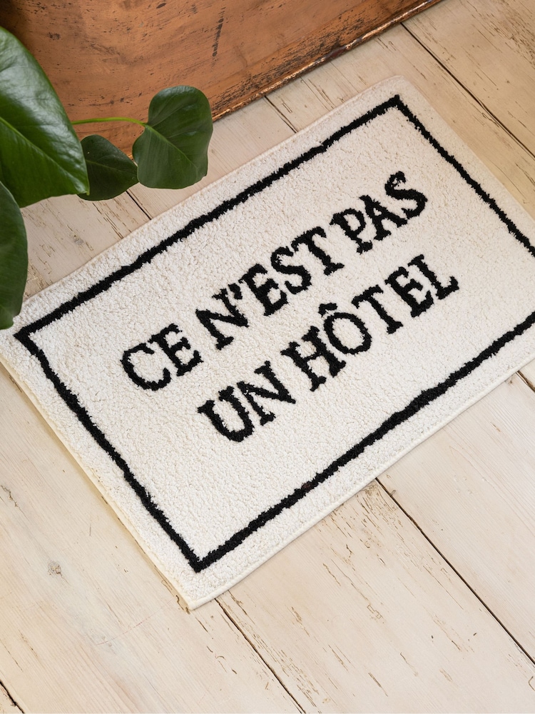Rockett St George Black/White Hotel Slogan Bath Mat - Image 1 of 6 Rockett St George Black/White Hotel Slogan Bath Mat - Image 1 of 6