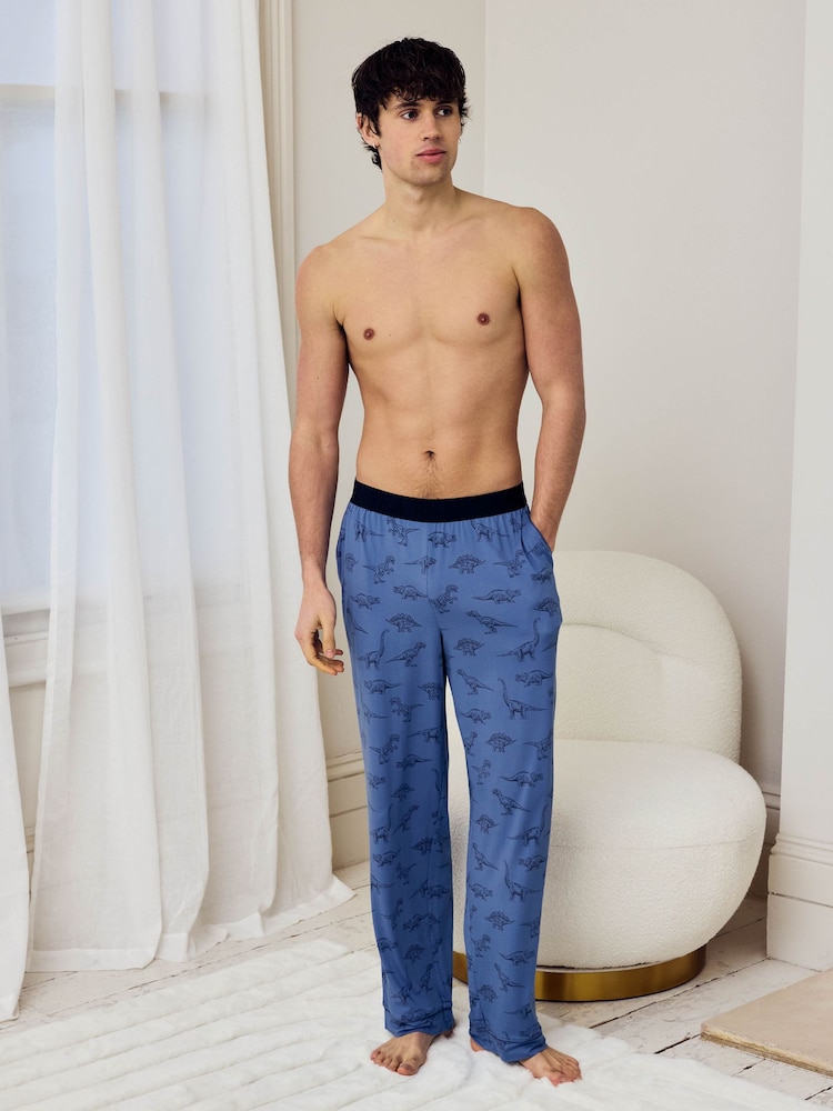 Chelsea Peers Blue Jurassic Dinosaur Print Long Pyjama Bottoms - Image 1 of 5 Chelsea Peers Blue Jurassic Dinosaur Print Long Pyjama Bottoms - Image 1 of 5