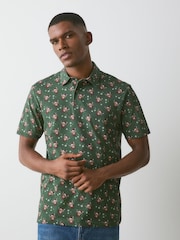 Green Hamish The Highland Cow Christmas Short Sleeve Motionflex Polo Shirt - Image 1 of 4