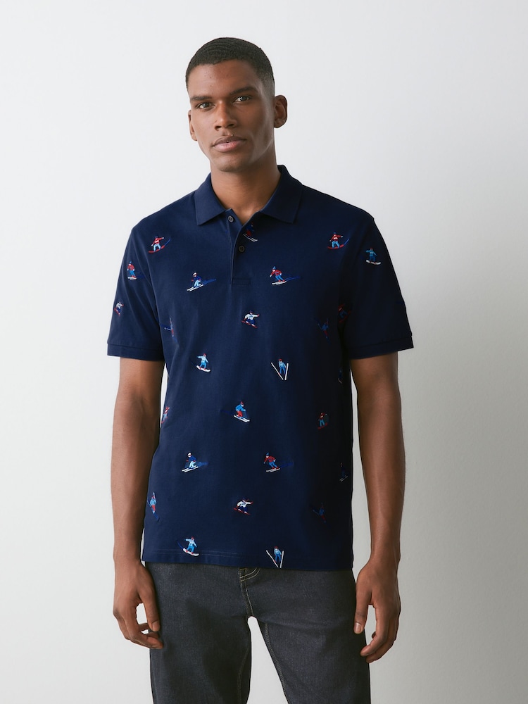Navy Christmas Ski Embroided Short Sleeve Motionflex Polo Shirt - Image 2 of 7 Navy Christmas Ski Embroided Short Sleeve Motionflex Polo Shirt - Image 2 of 7