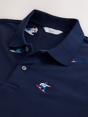 Navy Christmas Ski Embroided Short Sleeve Motionflex Polo Shirt - Image 6 of 7