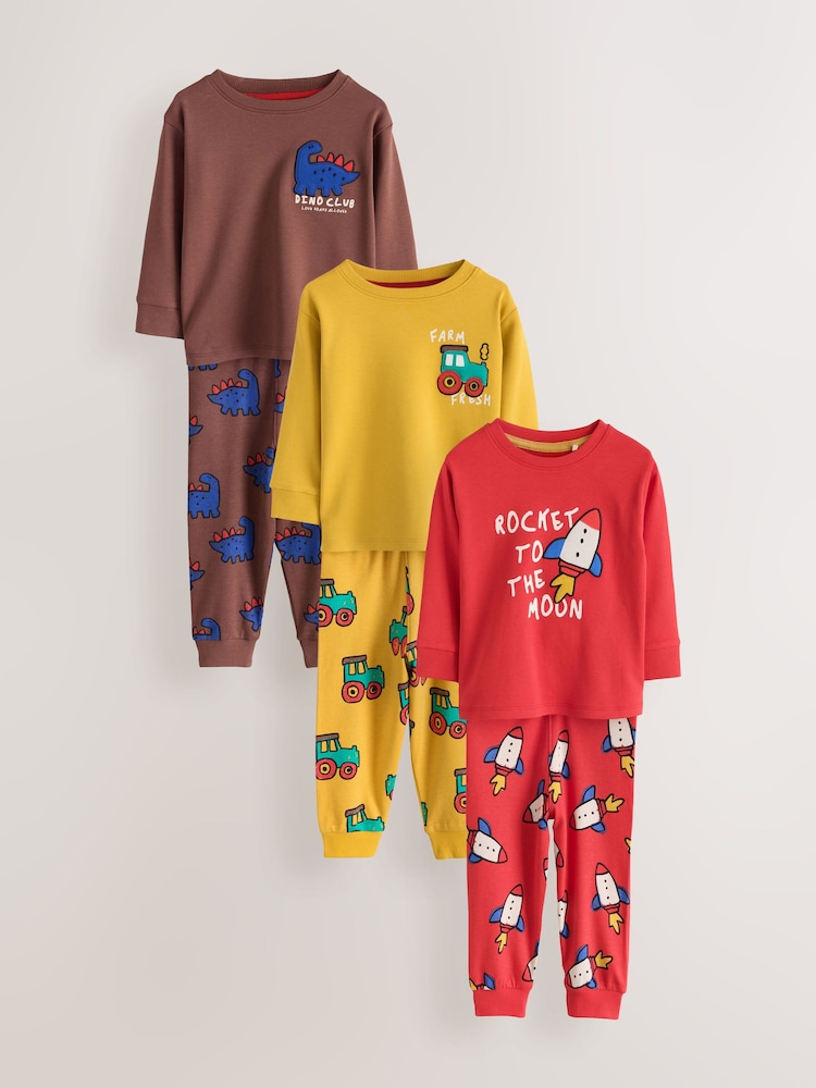 Red/Brown/Mustard Graphic Snuggle Pyjamas 3 Pack (9mths-8yrs) - Image 1 of 7 Red/Brown/Mustard Graphic Snuggle Pyjamas 3 Pack (9mths-8yrs) - Image 1 of 7
