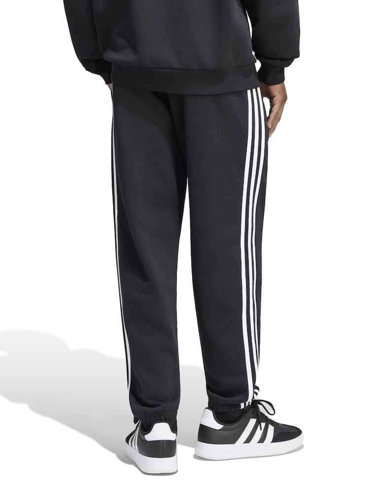 Sort - adidas Essentials 3-Striber fleecetilspidsede joggingbukser med manchetter - Billede 2 af 6 Sort - adidas Essentials 3-Striber fleecetilspidsede joggingbukser med manchetter - Billede 2 af 6