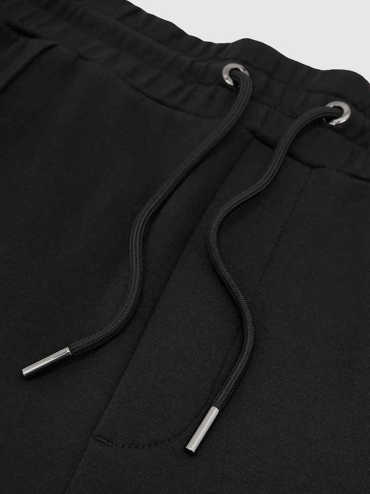 Schwarz - Reiss Finn Premium Interlock Cuffed Joggers - Bild 6 von 6 Schwarz - Reiss Finn Premium Interlock Cuffed Joggers - Bild 6 von 6