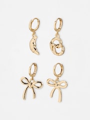 Oliver Bonas Gold Tone Sugar Bow, Croissant & Pretzel Charm Huggie Earrings Set of Four - Image 1 of 7