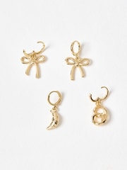Oliver Bonas Gold Tone Sugar Bow, Croissant & Pretzel Charm Huggie Earrings Set of Four - Image 2 of 7