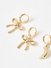 Oliver Bonas Gold Tone Sugar Bow, Croissant & Pretzel Charm Huggie Earrings Set of Four - Image 5 of 7