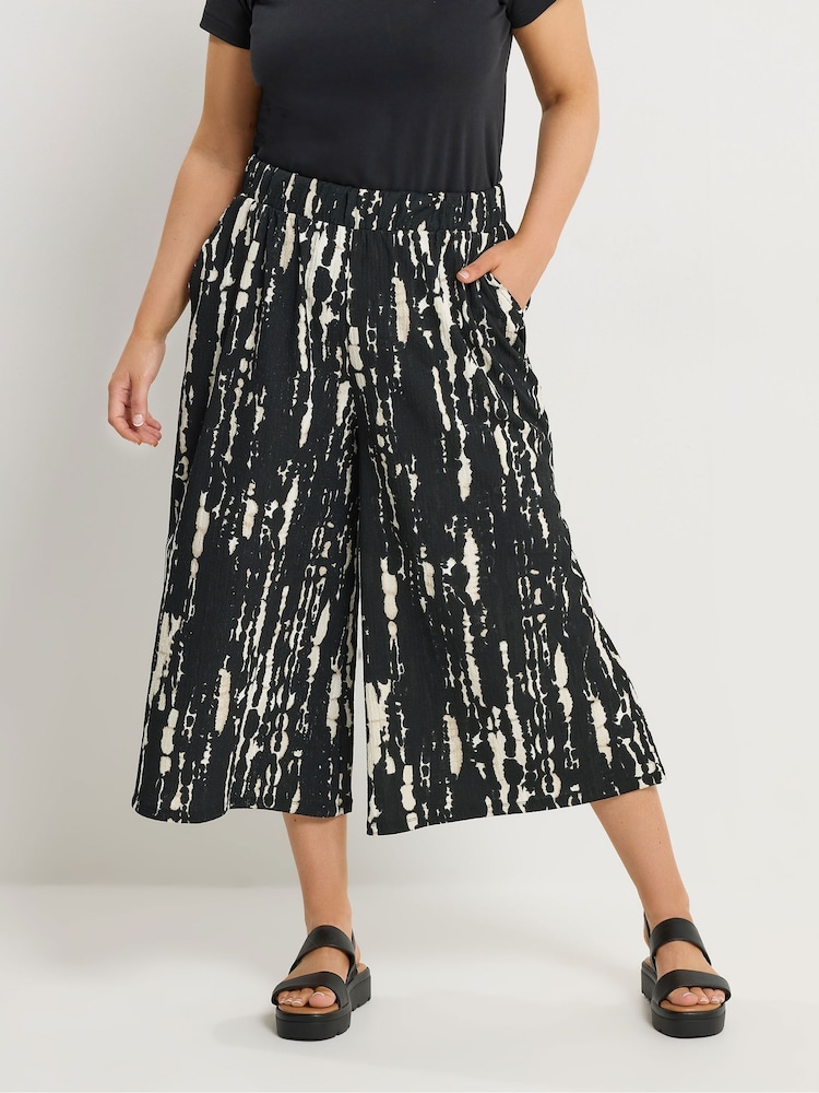 Yours Curve Black Cropped Abstract Wide Leg Trousers - Image 1 of 5 Yours Curve Black Cropped Abstract Wide Leg Trousers - Image 1 of 5