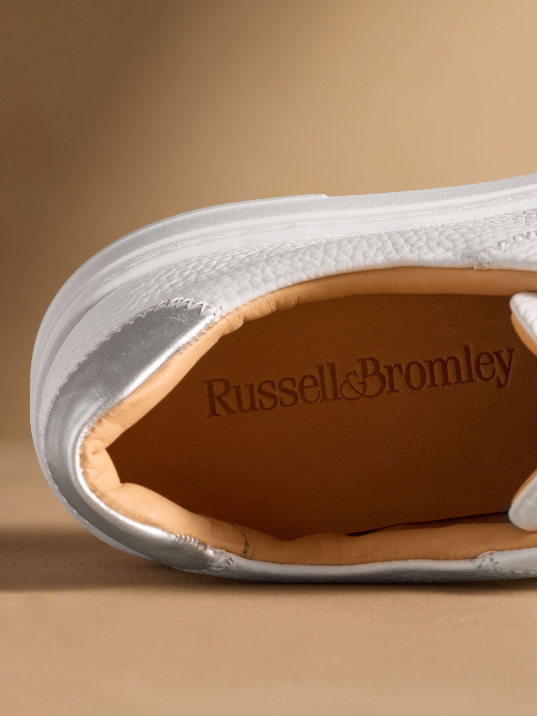 Buy Russell & Bromley White Park Mid Flatform Laceless  Russell & Bromley White Slip-On Leather Sneakers main image 0