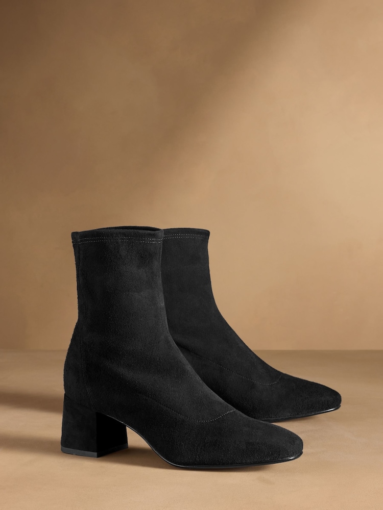 Russell & Bromley Black Harrington Short Block Heel Sock Boots - Image 1 of 7 Russell & Bromley Black Harrington Short Block Heel Sock Boots - Image 1 of 7