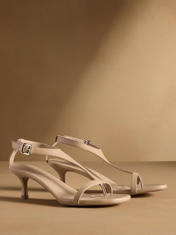 Russell & Bromley Neutral Edgebold T-Bar Heeled Sandals - Image 1 of 7 Russell & Bromley Neutral Edgebold T-Bar Heeled Sandals - Image 1 of 7
