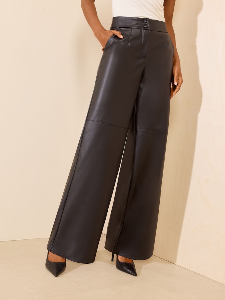 Friends Like These Black Faux Leather Tailored Wide Leg Trousers - Image 1 of 6 Friends Like These Black Faux Leather Tailored Wide Leg Trousers - Image 1 of 6