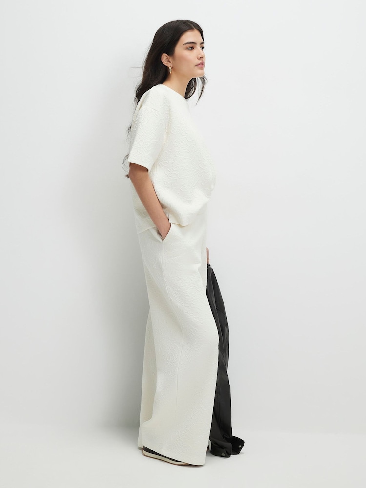 River Island Cream Petite Jacquard Wide Leg Trousers - Image 1 of 4