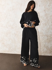 Rockett St George Black Swallow Embroidered Wide Leg Joggers - Image 1 of 6